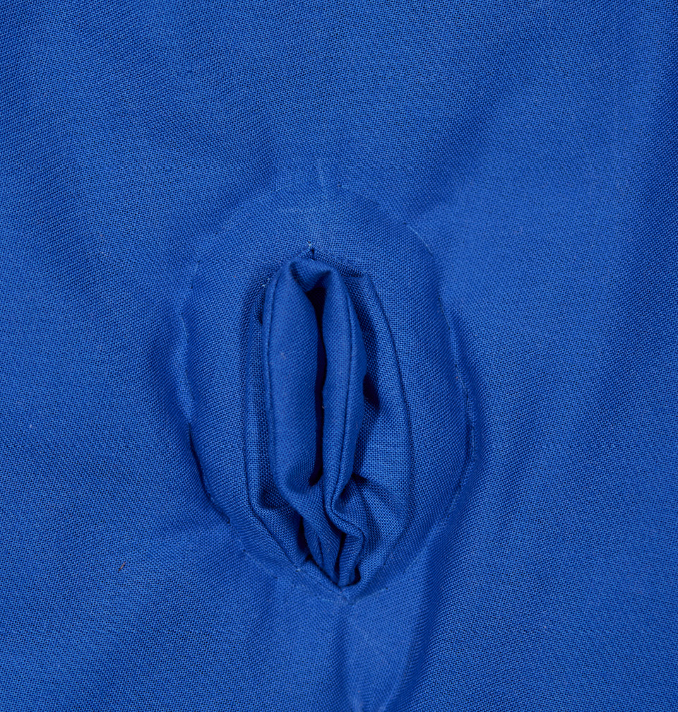 Detail of the blue figure's folded form